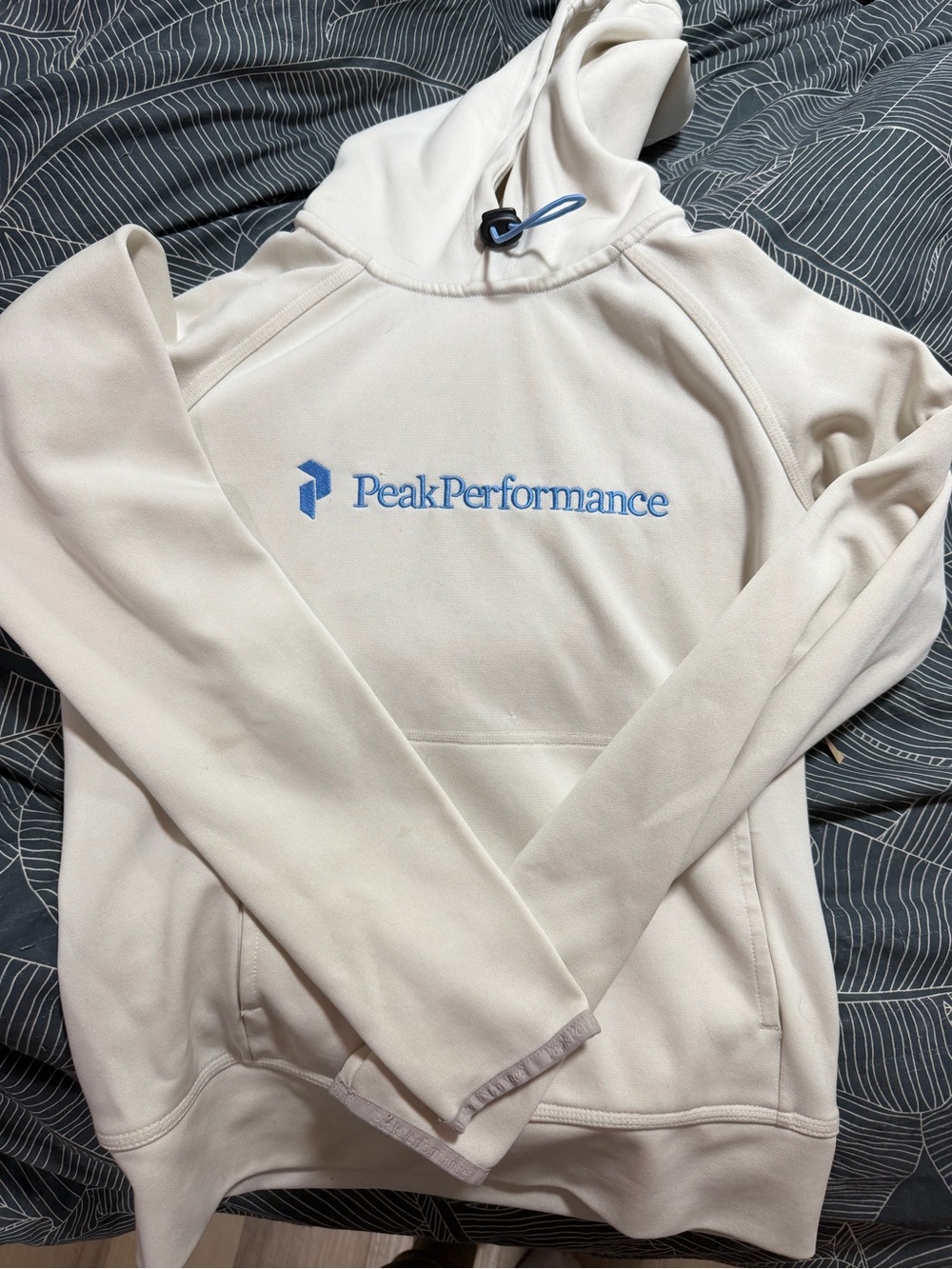 Peak Performance femme Cream Hoodie with Blue Logo